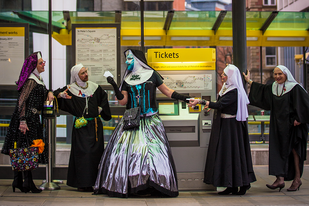 The Manchester Sisters posing at St Peters Square by Si Hands